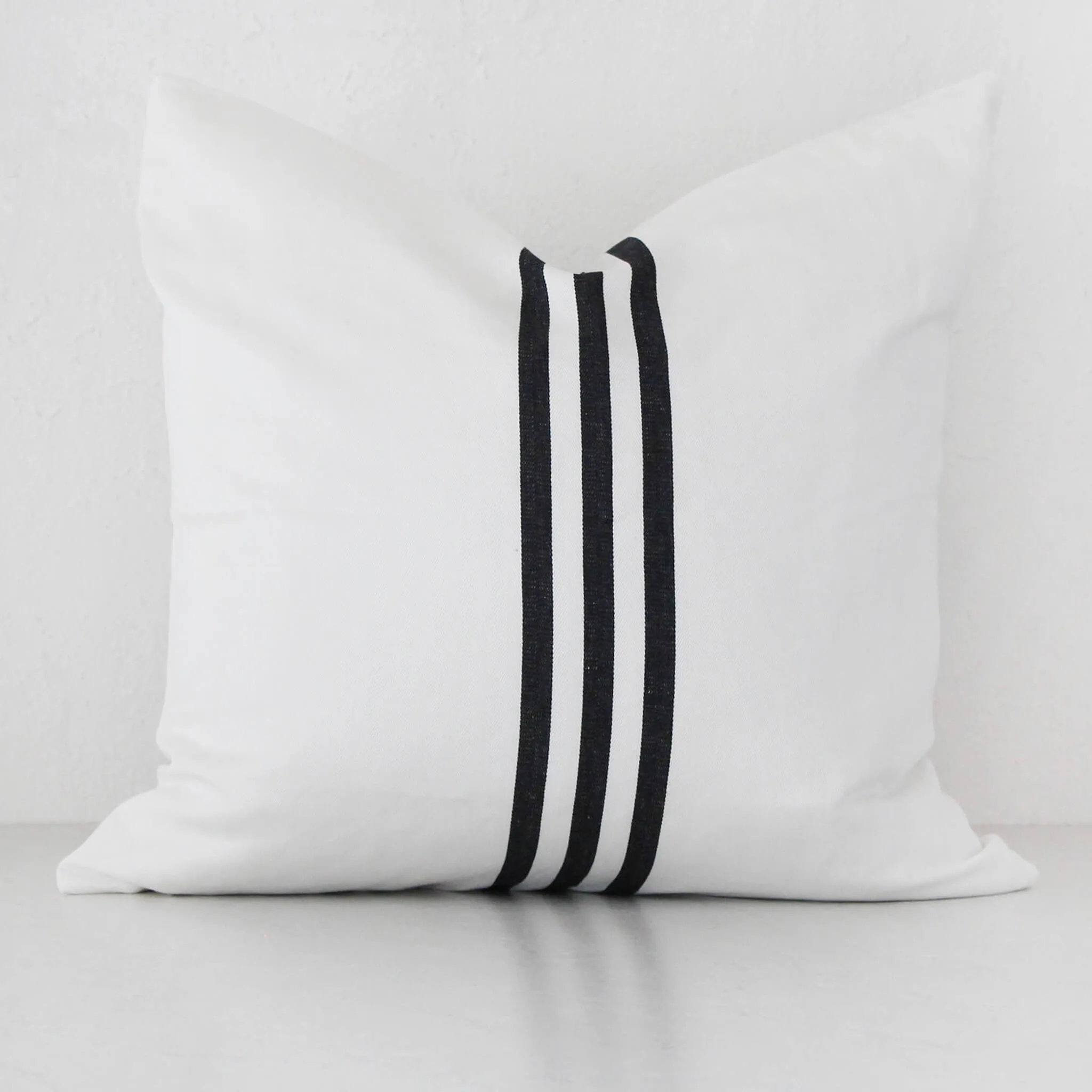 KUTA HERRINGBONE CUSHION  | 55X55CM  |  WHITE BASE   BLACK STRIPE
