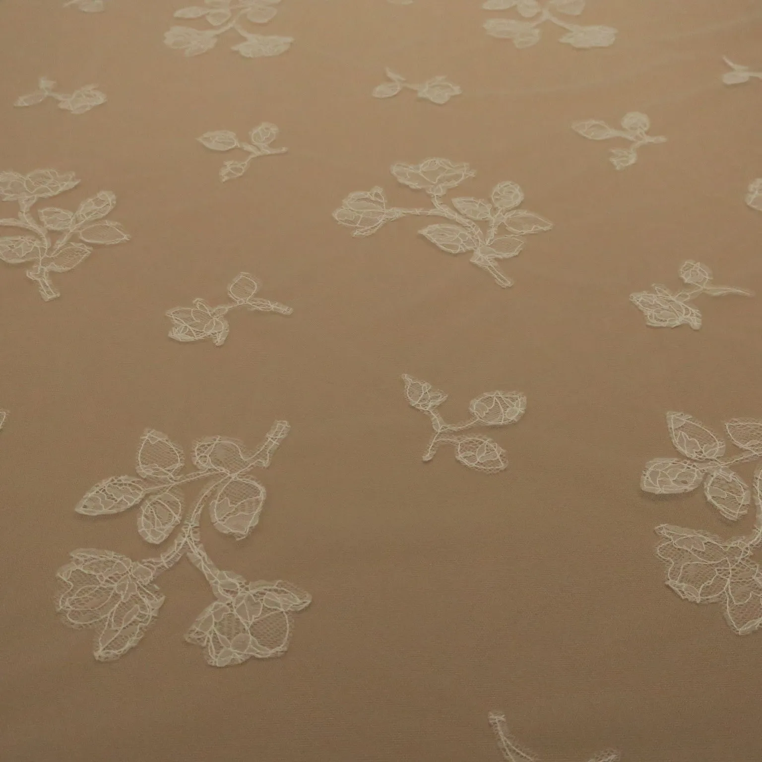 White Tulle with White Floral Design Embroidered Fabric